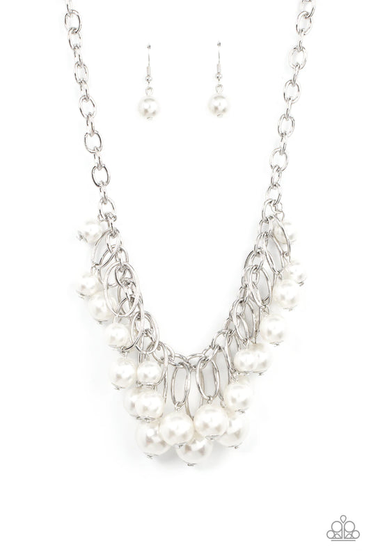 Paparazzi Accessories Powerhouse Pose - White Oversized white pearls dance from the bottoms of shiny silver ovals that delicately cluster along a chunky silver chain, resulting in a luxurious fringe below the collar. Features an adjustable clasp closure.