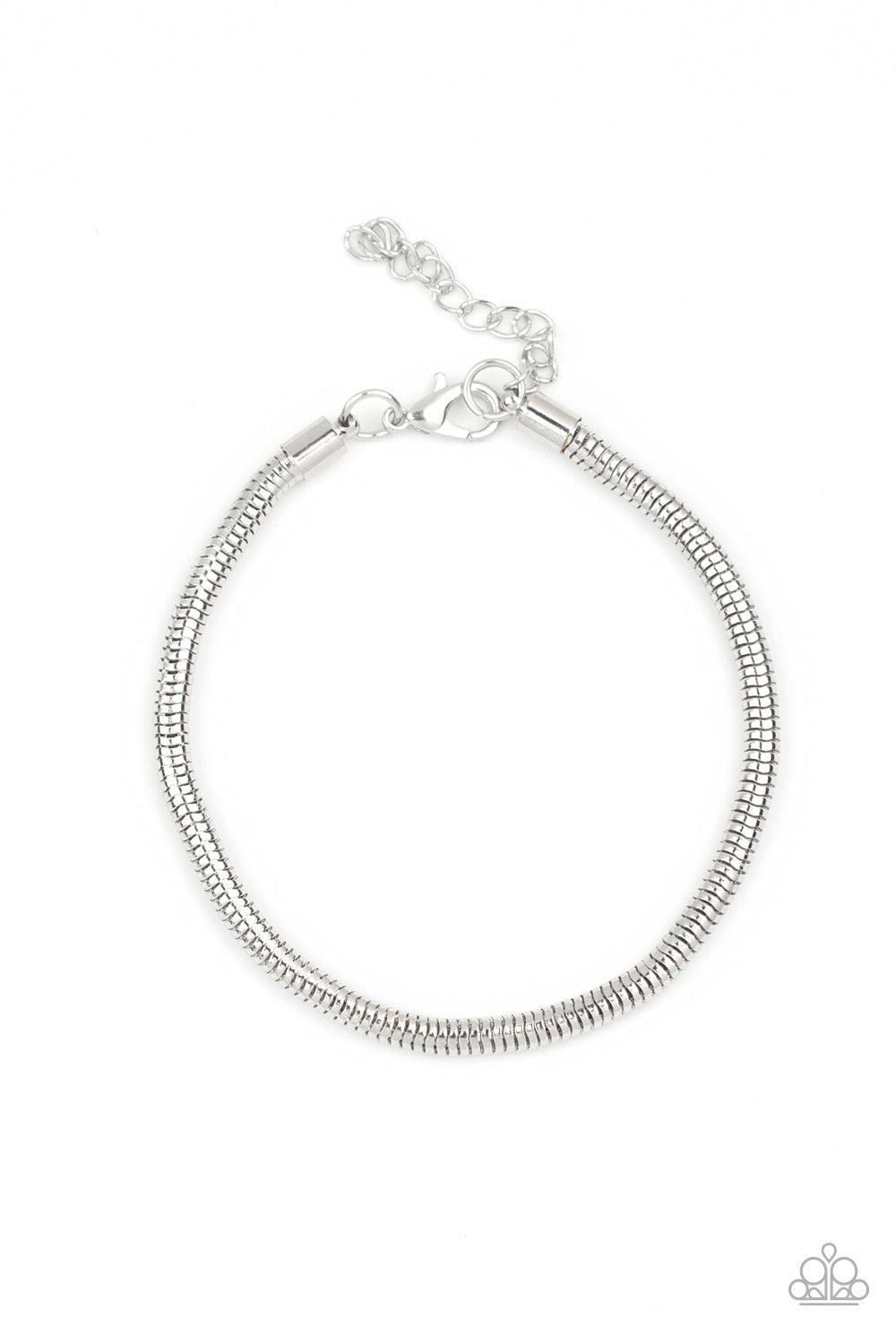 Paparazzi Accessories Winning - Silver Brushed in a high-sheen shimmer, a rounded silver snake chain links around the wrist for a sleek look. Features an adjustable clasp closure. Jewelry