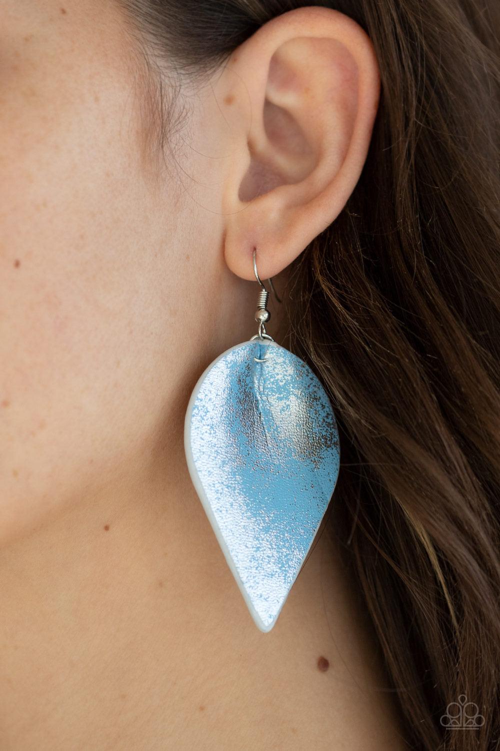 Paparazzi Accessories Enchanted Shimmer - Blue Dusted in a silvery shimmer, a leathery Faded Denim leaf swings from the ear for an enchanted look. Earring attaches to a standard fishhook fitt Jewelry