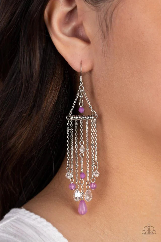 Paparazzi Accessories Marina Breeze - Purple Tassels of silver chains fall from the bottom of a silver bar suspended by a pair of satellite chains. A faceted Lavender bead swings from the top of the frame, with additional Lavender accents and clear crysta