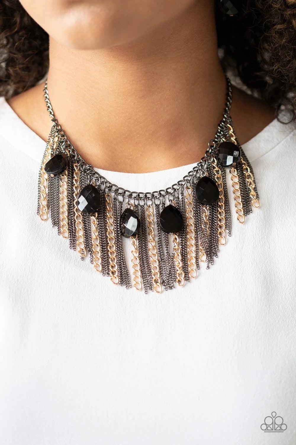 Paparazzi Accessories Vixen Conviction - Multi Infused with a row of faceted black teardrops, mismatched strands of gold and gunmetal chains stream from the bottom of a glistening gunmetal chain, creating a statement-making fringe below the collar. Featur