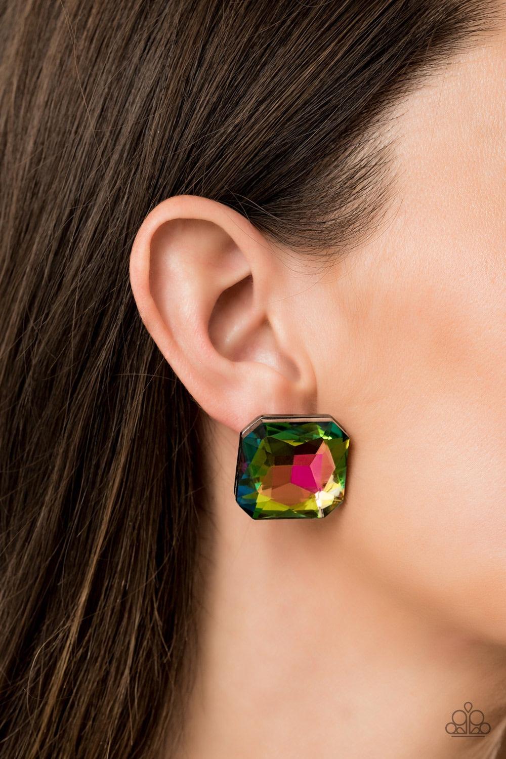 Paparazzi Accessories Show Glow - Multi Featuring a rainbow iridescence, a dramatically oversized gem is nestled inside a double stacked gunmetal frame for a show-stopping glare. Earring attaches to a standard post fitting. Jewelry