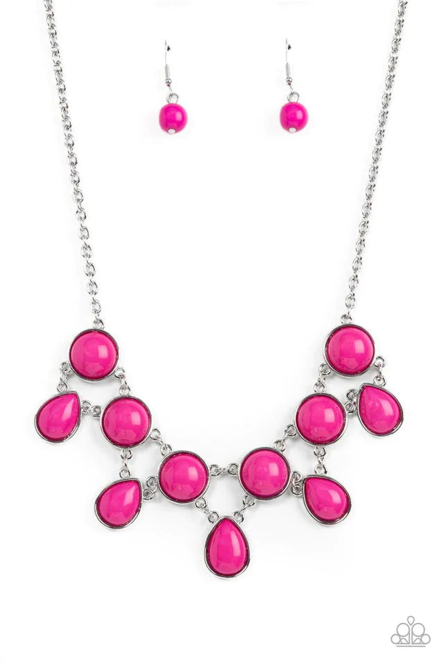 Paparazzi Accessories Very Valley Girl - Pink This bold necklace adds a pop of color to your ensemble. Our "Very Valley Girl" features eye-catching Fuchsia Fedora teardrop beads that link along a bottom row of accessory links. With all this pink chic, it