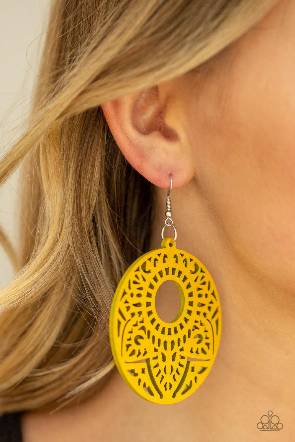 Paparazzi Accessories Mandala Mambo - Yellow Featuring a mandala-like pattern, a yellow wooden frame swings from the ear for a seasonal look. Earring attaches to a standard fishhook fitting. Jewelry