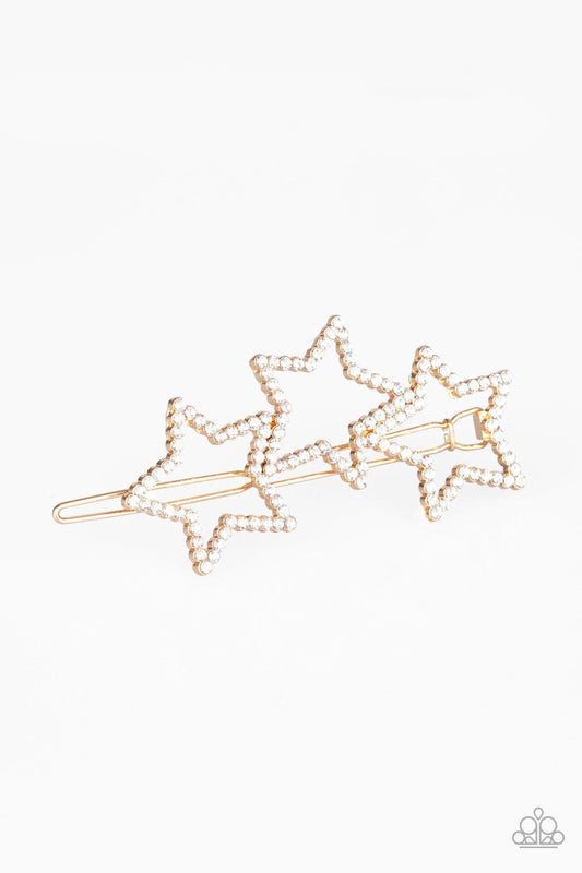 Paparazzi Accessories Thank My Lucky Stars - Gold A trio of glittery white rhinestone encrusted stars pulls back the hair for a patriotic inspired flair. Features a clamp barrette closure. Hair Accessories