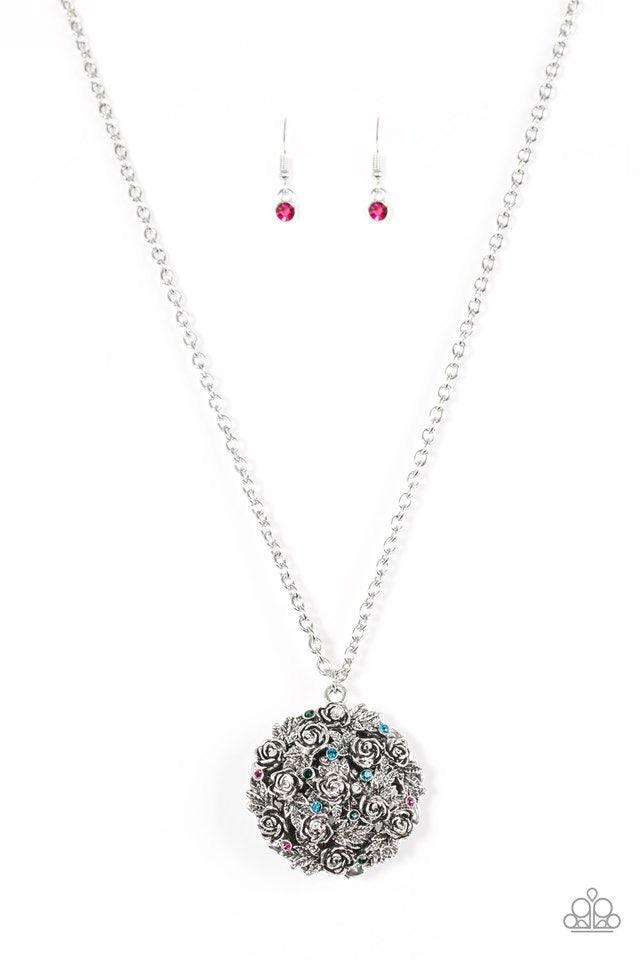 Paparazzi Accessories Royal In Roses - Multi Leafy silver rosebuds coalesce into a dramatic 3-dimensial pendant. Colorful rhinestones are sprinkled across the front of the vintage inspired pendant for a regal finish. Features an adjustable clasp closure.