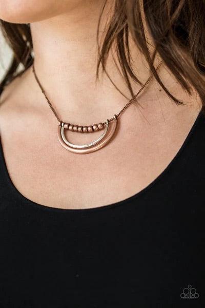 Paparazzi Accessories Artificial Arches - Copper A strand of shiny copper beads give way to bowing silver and copper frames, creating an edgy pendant below the collar. Features an adjustable clasp closure. Sold as one individual necklace. Includes one pai