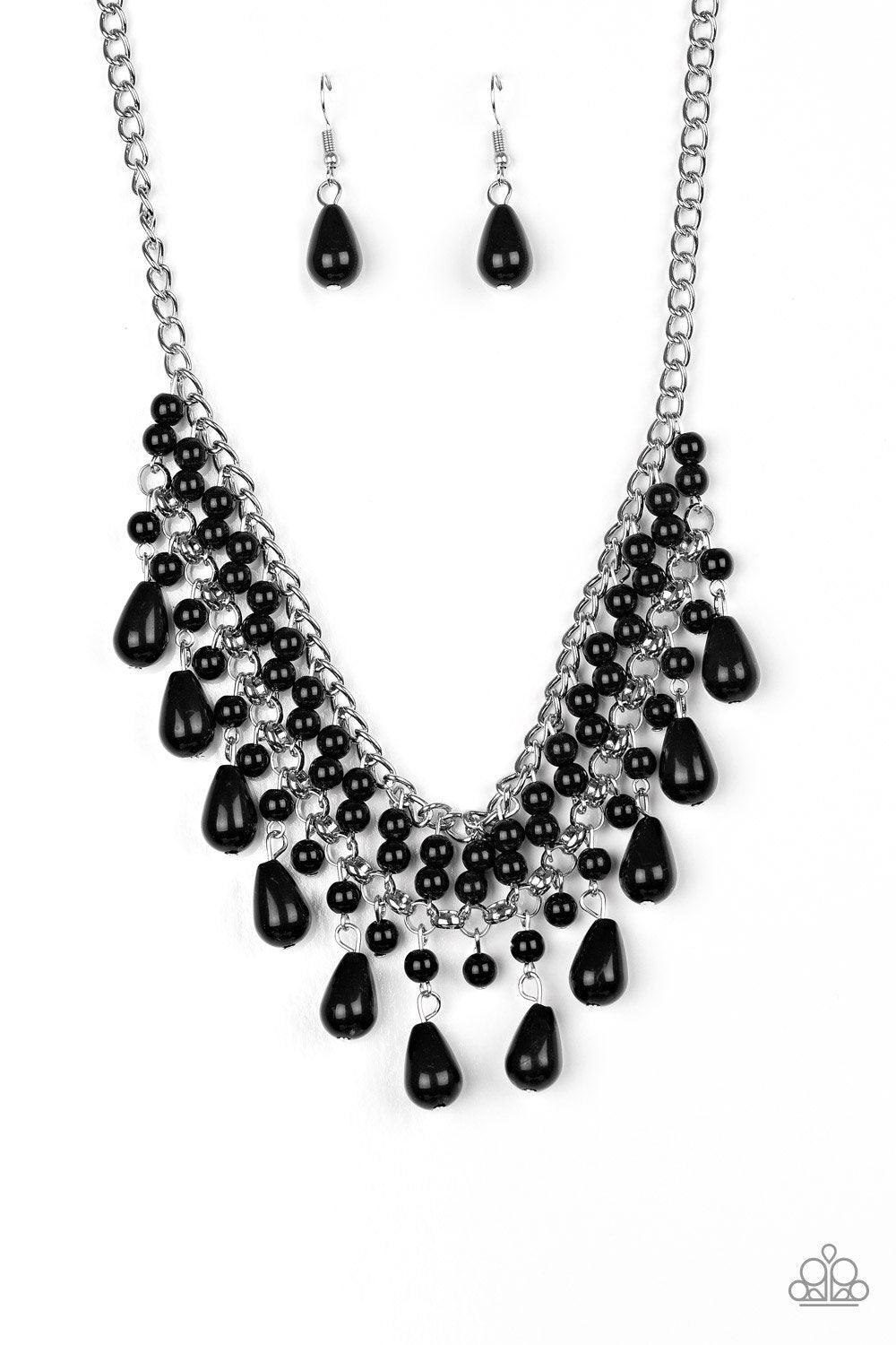 Paparazzi Accessories The Guest List - Black Threaded along metallic rods, pairs of black beads are stacked between two silver chains. Matching black beads and shiny black teardrops drip from the bottom, creating a refined fringe below the collar. Feature
