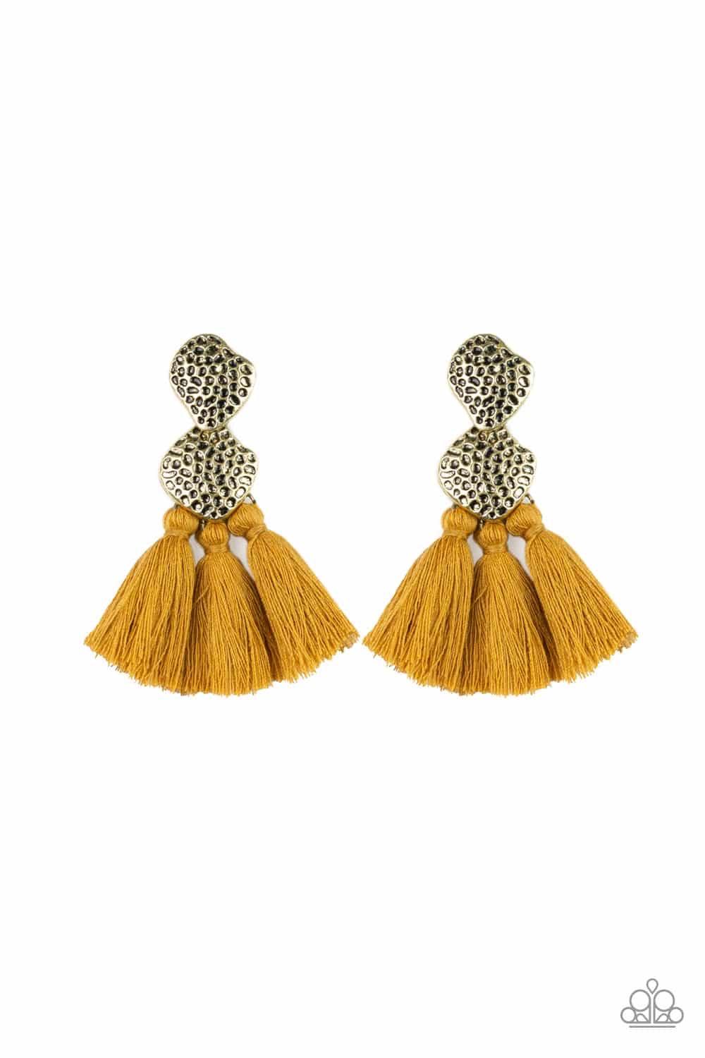 Paparazzi Accessories Tenacious Tassel - Yellow Delicately hammered in glistening textures, two asymmetrical brass frames link into an abstract lure. Three yellow threaded tassels swing from the bottom of the rustic frame for a trendy finish. Earring atta