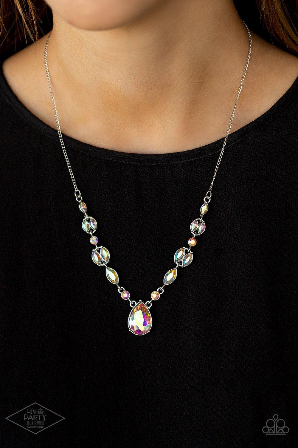 Paparazzi Accessories Royal Rendezvous ~Multi Featuring regal marquise style cuts, glittery iridescent rhinestones trickle along a shimmery silver chain below the collar. A dramatic teardrop rhinestone drips from the center, creating a breathtaking pendan