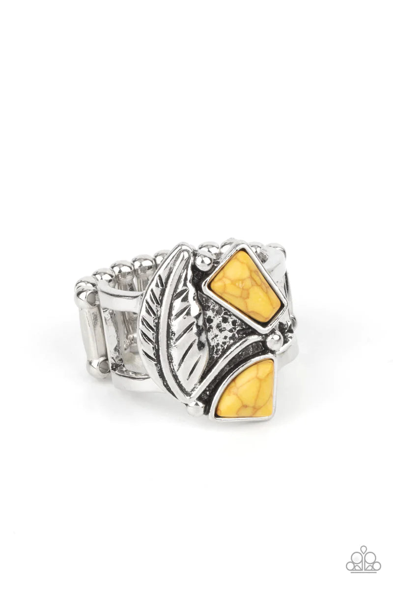 Paparazzi Accessories Make The Nest Of It - Yellow Asymmetrical yellow stones adorn the front of an antiqued silver frame adorned in a silver feather, creating a rustic centerpiece atop the finger. Features a stretchy band for a flexible fit. Sold as one
