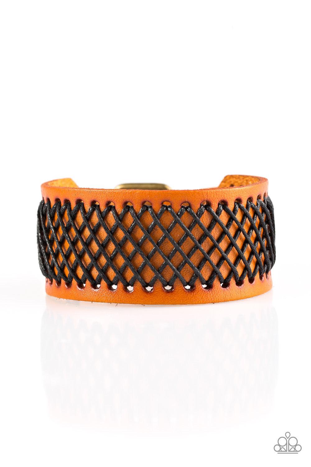 Paparazzi Accessories Cross the Line - Brown Shiny black thread is stitched across the front of a brown leather band. The crisscrossing threads create a tactile pattern around the wrist. Features an adjustable buckle closure. Jewelry
