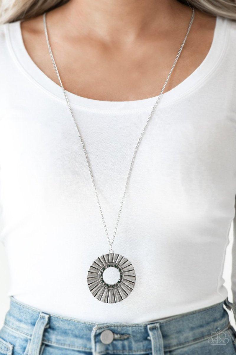 Paparazzi Accessories Chicly Centered - Multi Brushed in a gritty antiqued finish, a rippling silver frame flares from a multicolored rhinestone encrusted center for an edgy look. Features an adjustable clasp closure. Sold as one individual necklace. Incl