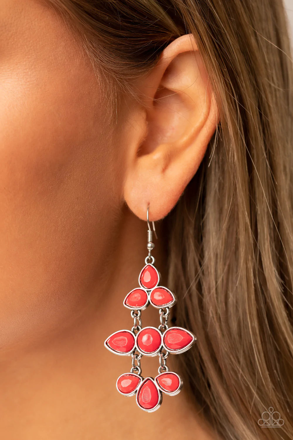 Paparazzi Accessories Bay Breezin - Red Encased in sleek silver frames, faceted red teardrop and round beads delicately stack and link into a timelessly tiered chandelier. Earring attaches to a standard fishhook fitting. Sold as one pair of earrings. Jewe