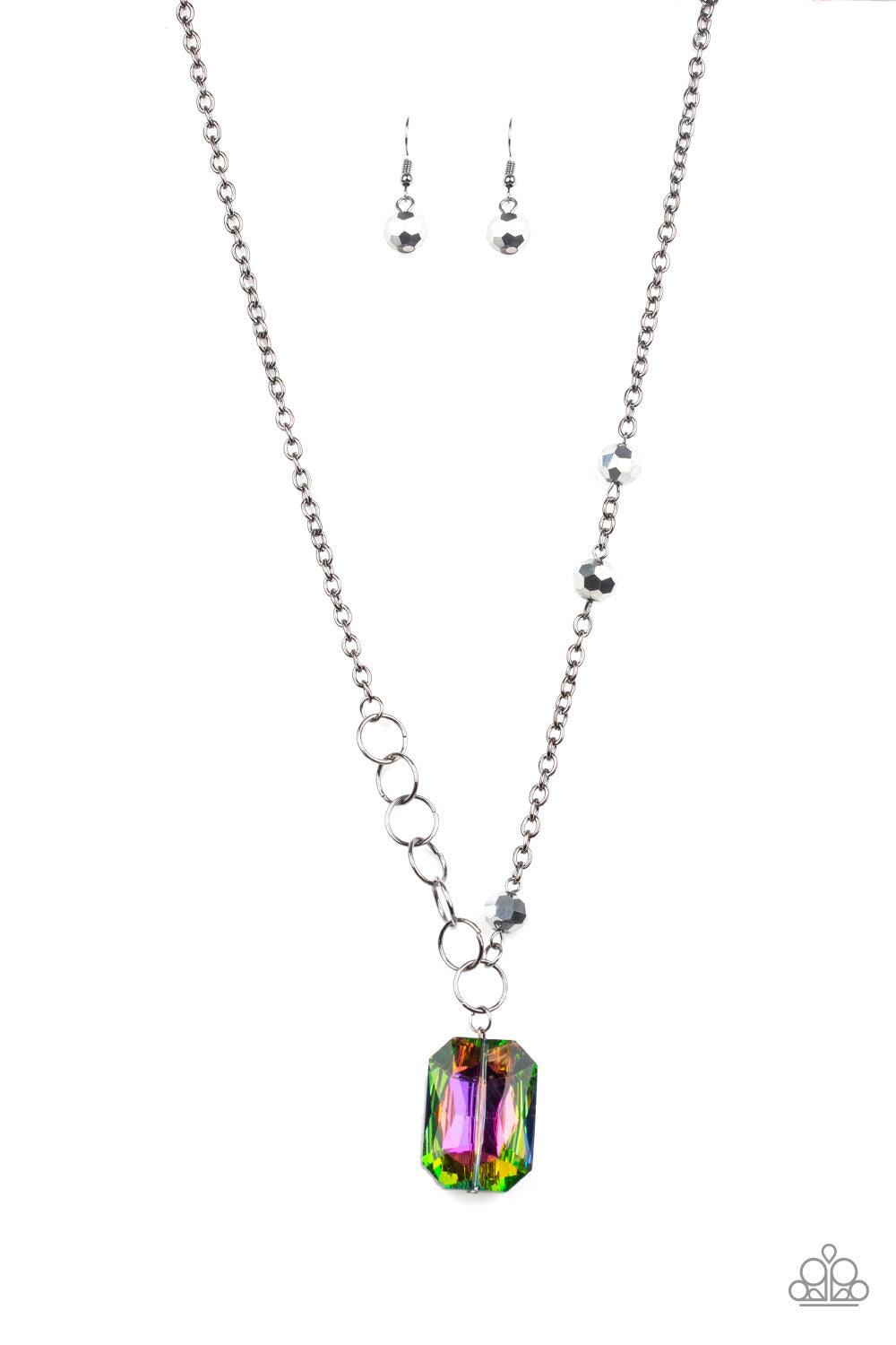 Paparazzi Accessories Never A Dull Moment - Multi A trio of faceted hematite crystal-like beads asymmetrically trickle along a mismatched gunmetal chain. Featuring a regal emerald-cut, an oversized rainbow gem swings from the bottom of the gunmetal chain