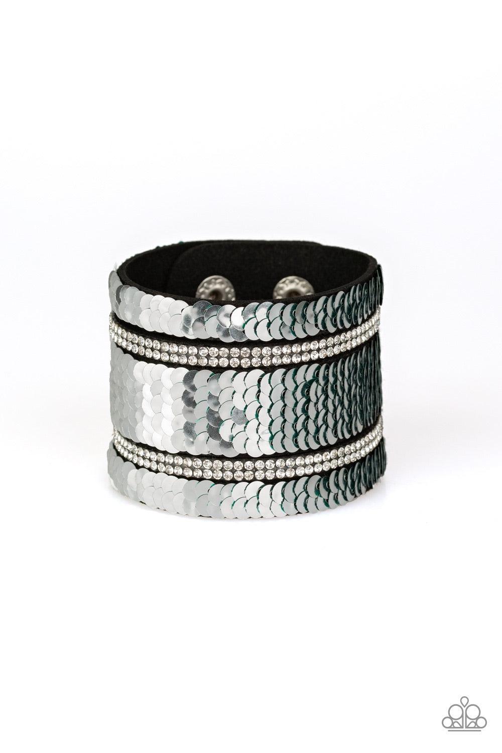 Paparazzi Accessories Mermaid Service - Green Infused with strands of blinding white rhinestones, row after row of shimmery sequins are stitched across the front of a spliced black suede band. Bracelet features reversible sequins that change from silver t