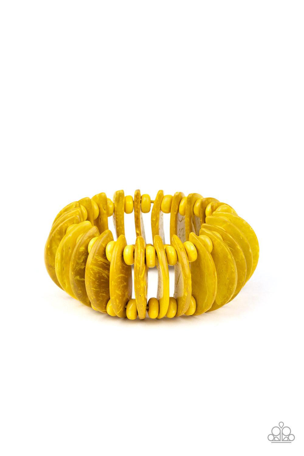 Paparazzi Accessories Tropical Tiki Bar - Yellow Infused with yellow wooden beads, distressed yellow wooden crescents are threaded along stretchy bands around the wrist for a summery look. Sold as one individual bracelet. Jewelry