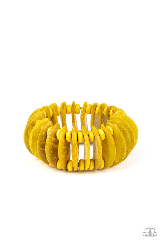 Paparazzi Accessories Tropical Tiki Bar - Yellow Infused with yellow wooden beads, distressed yellow wooden crescents are threaded along stretchy bands around the wrist for a summery look. Sold as one individual bracelet. Jewelry
