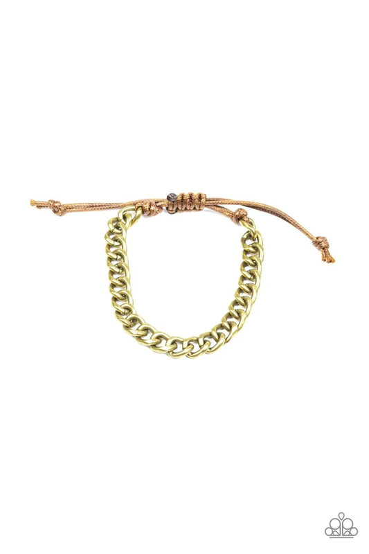 Paparazzi Accessories Blitz - Brass Shiny brown cording knots around the ends of a brass beveled cable chain that is wrapped across the top of the wrist for a versatile look. Features an adjustable sliding knot closure. Jewelry