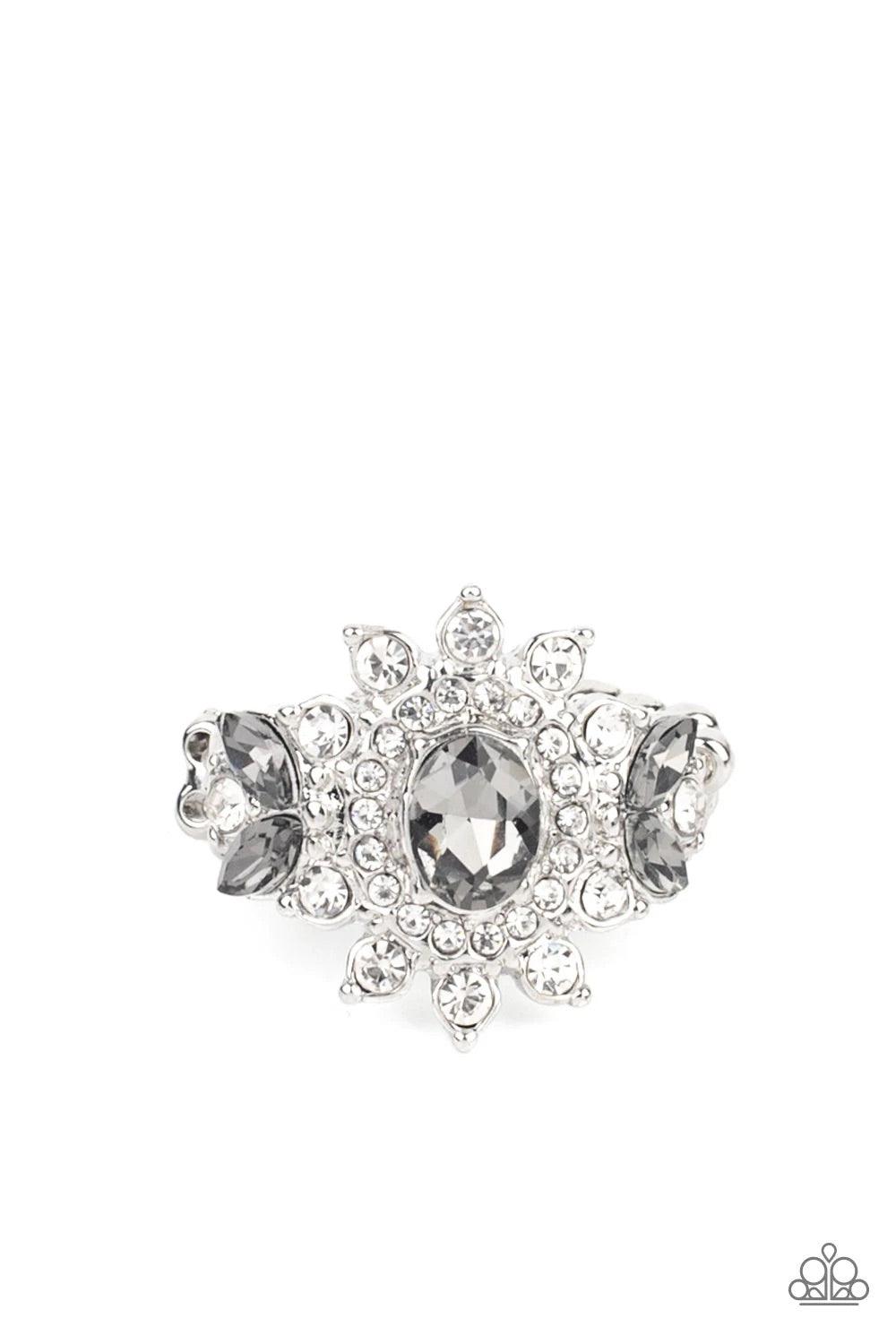 Paparazzi Accessories The Princess and the FROND - Silver Glassy white rhinestone petals flare out from an oval smoky rhinestone center. Dainty smoky marquise rhinestones embellish the sides of the glittery frame, adding regal leafy accents. Features a st