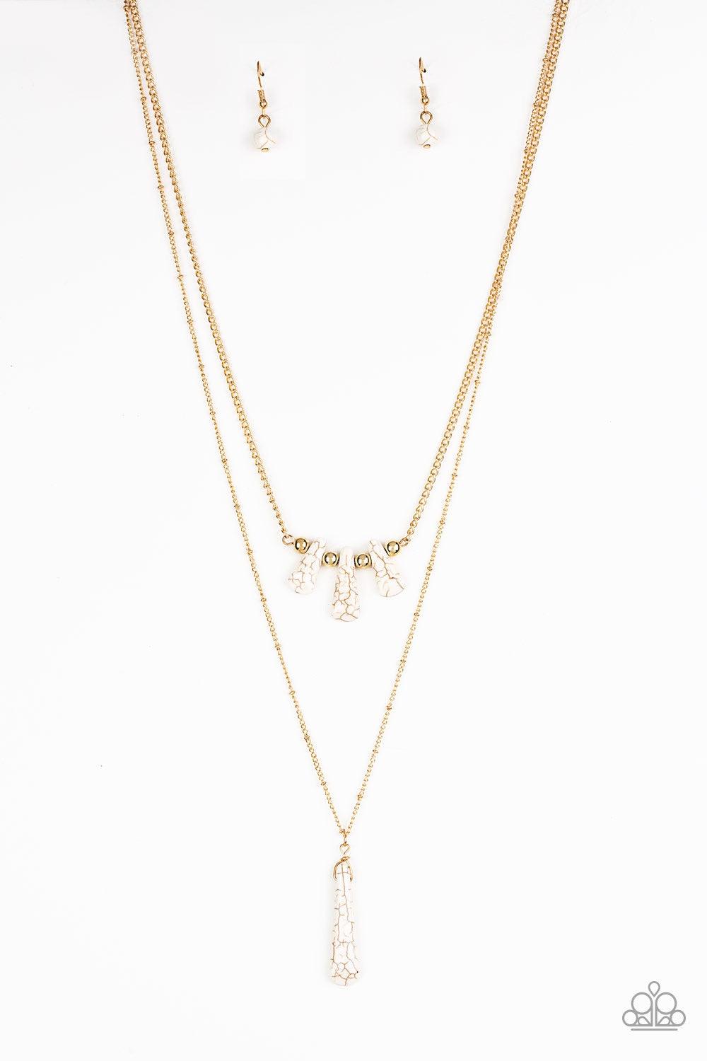 Paparazzi Accessories Basic Groundwork - White Chiseled into flared teardrop shapes, a dainty fringe of white stones and golden beads gives way to a large stone pendant, creating earthy layers down the chest. Features an adjustable clasp closure. Jewelry