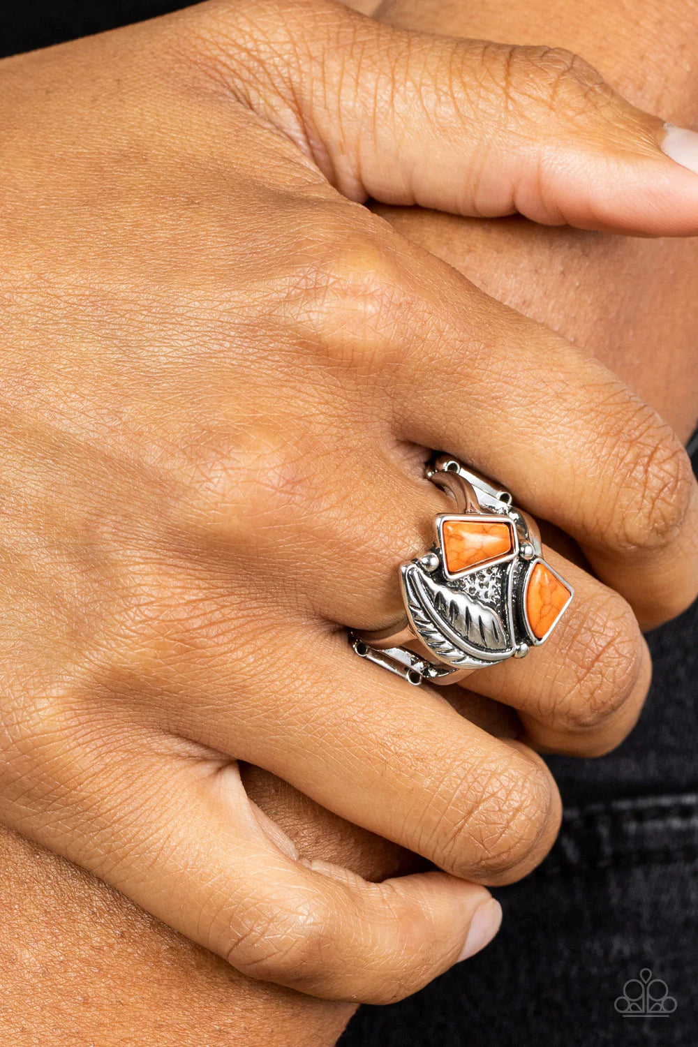 Paparazzi Accessories Make the NEST of It - Orange Asymmetrical orange stones adorn the front of an antiqued silver frame adorned in a silver feather, creating a rustic centerpiece atop the finger. Features a stretchy band for a flexible fit. Sold as one