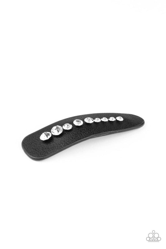 Paparazzi Accessories Snap Out Of It - Black Graduating in size, a line of glassy white rhinestones is encrusted down the center of a black leather frame. Features a standard snap hair clip on the back. Sold as one individual hair clip. Hair Accessories