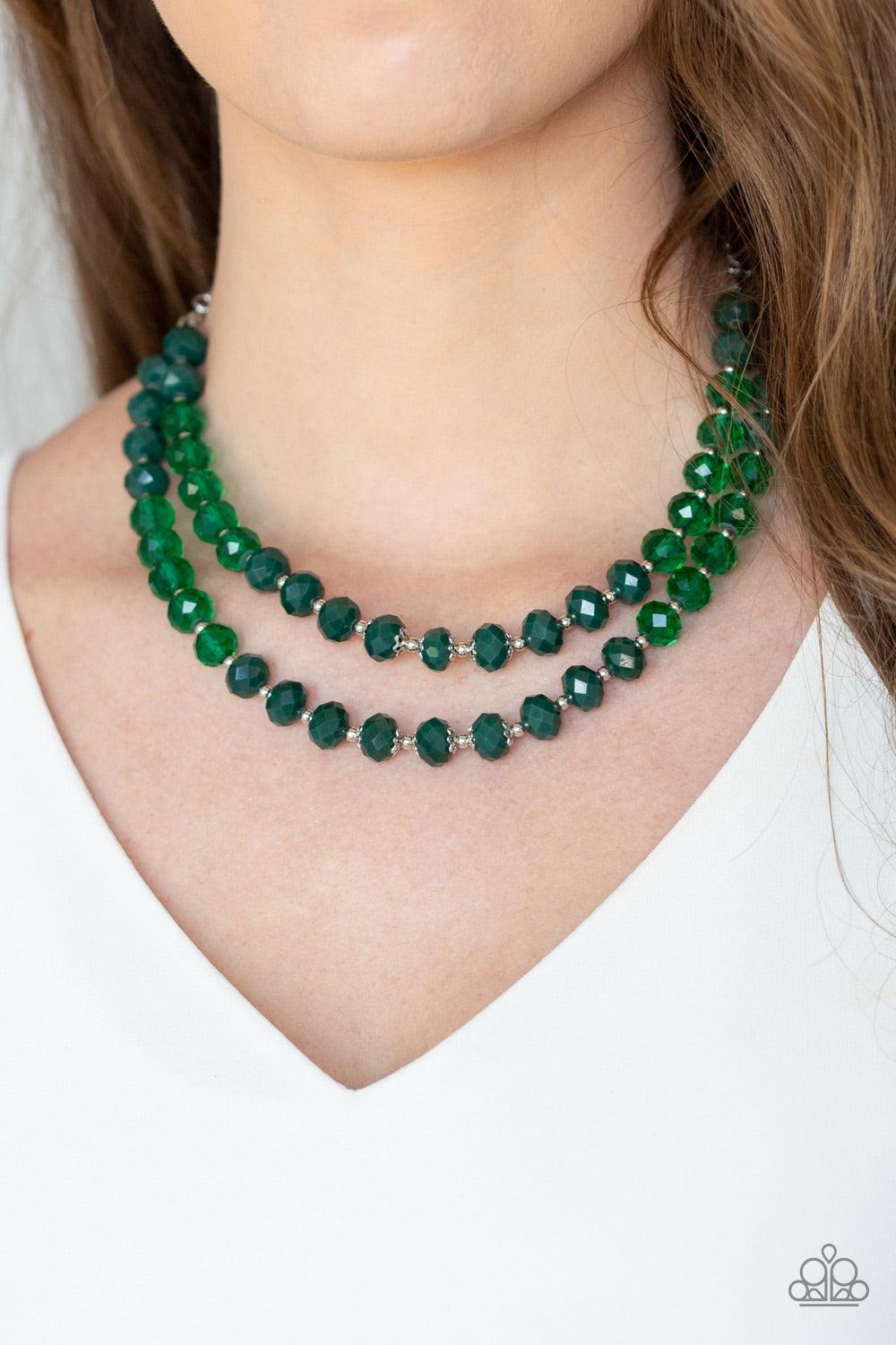 Paparazzi Accessories Glitter Gratitude - Green Infused with dainty silver beads, a collection of glassy and polished green crystal-like beads are threaded along two invisible wires below the collar, creating glamorous layers below the collar. Features an