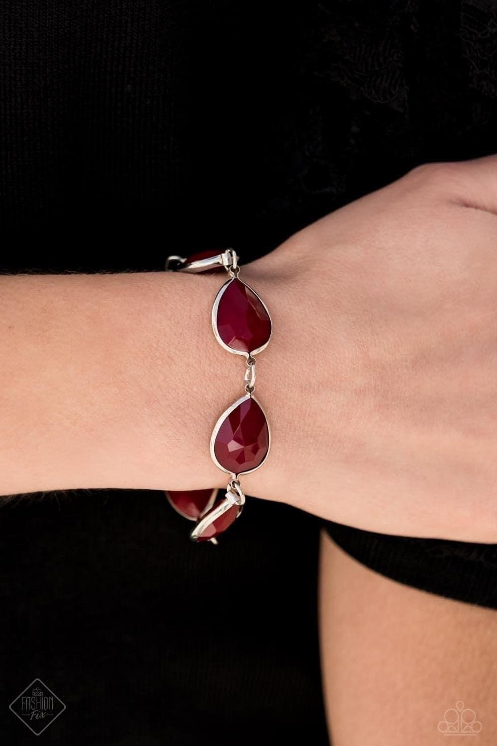Paparazzi Accessories REIGNy Days - Red Encased in sleek silver frames, faceted Wine acrylic teardrops delicately link around the wrist for an elegant pop of color. Features an adjustable clasp closure. Sold as one individual bracelet. Jewelry