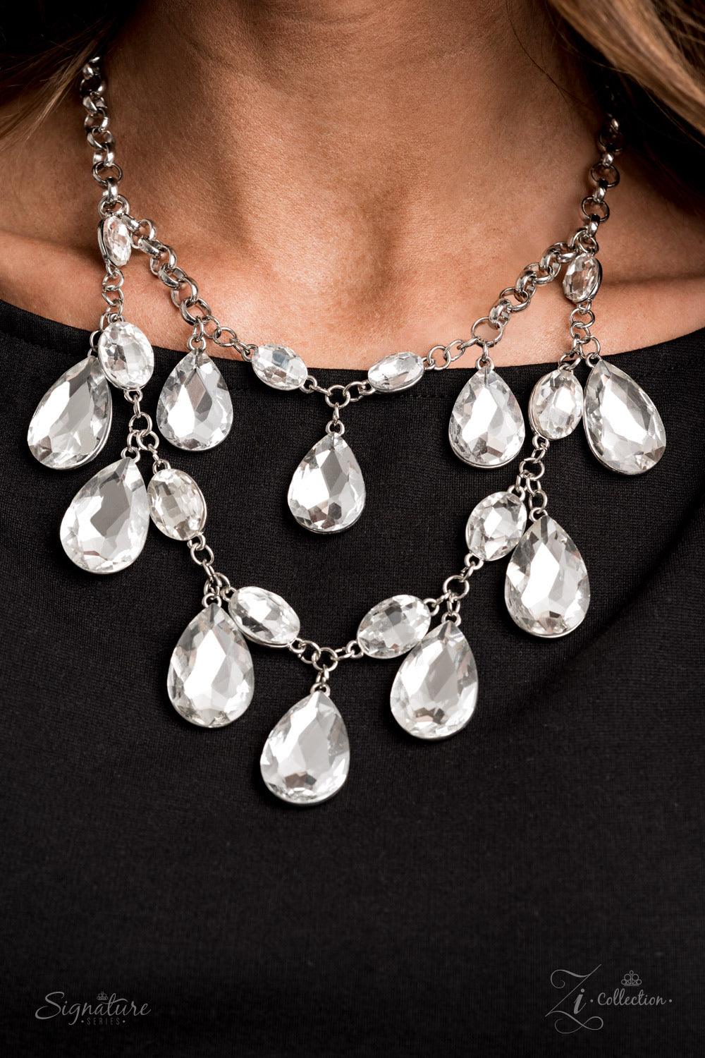 Paparazzi Accessories The Sarah 💗💗ZiCollection $25💗💗 Tiers of oversized white teardrop gems demand attention as they drip from two blinding rows of elegantly linked white oval rhinestones. Infused with sections of chunky silver chain links, the sparkl