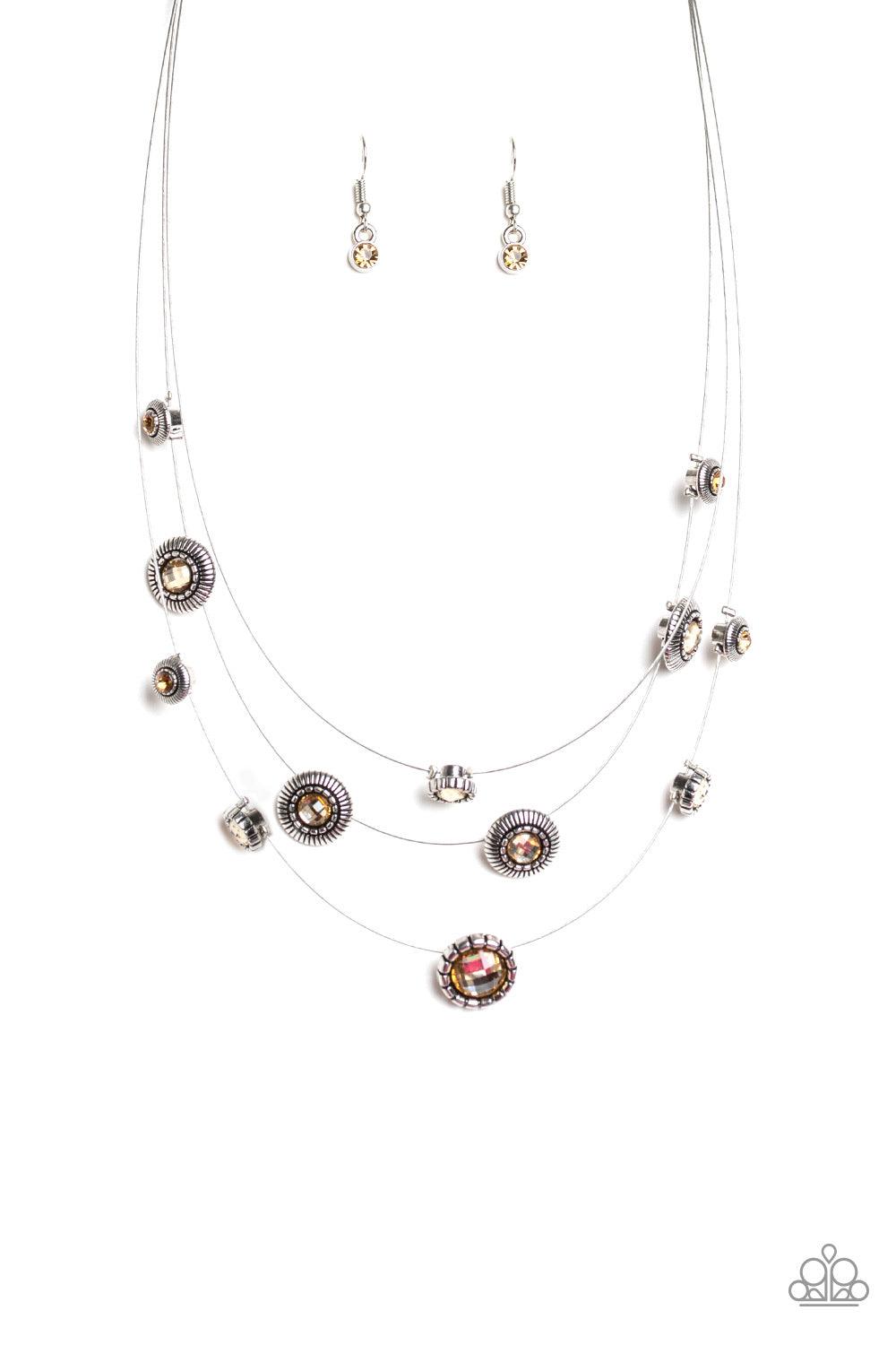 Paparazzi Accessories SHEER Thing - Brown Dotted with topaz rhinestone centers, an array of ornate silver frames trickle along skinny silver wires below the collar for a whimsical flair. Features an adjustable clasp closure. Jewelry