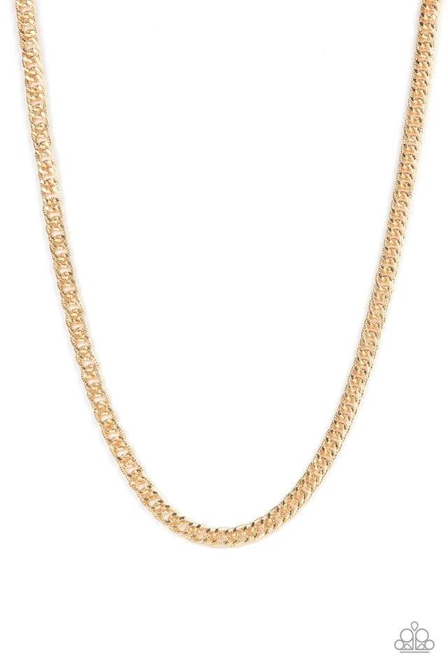 Paparazzi Accessories Valiant Victor - Gold Featuring diamond-cut textures on one side and a smooth finish on the other, a glistening gold curb chain drapes below the collar for a reversible versatile look. Features an adjustable clasp closure. Sold as on