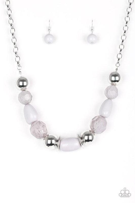 Paparazzi Accessories South Shore Sensation - Silver Dramatic silver, neutral gray, and faceted cloudy beads are threaded along an invisible wire below the collar for a seasonal look. Features an adjustable clasp closure. Jewelry