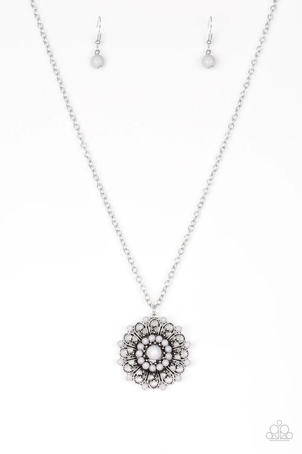 Paparazzi Accessories Boho Bonanza - Silver Neutral gray beads are sprinkled along ornate silver petals, creating a colorful floral frame. The whimsical pendant swings from the bottom of a lengthened silver chain for a seasonal look. Features an adjustabl