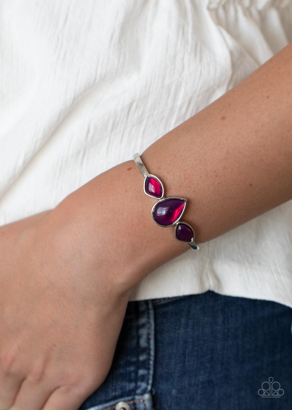 Paparazzi Accessories Boho Beach Babe - Purple Oversized glassy purple stones are encrusted across the center of a dainty silver cuff, creating a colorful centerpiece. Sold as one individual bracelet. Jewelry