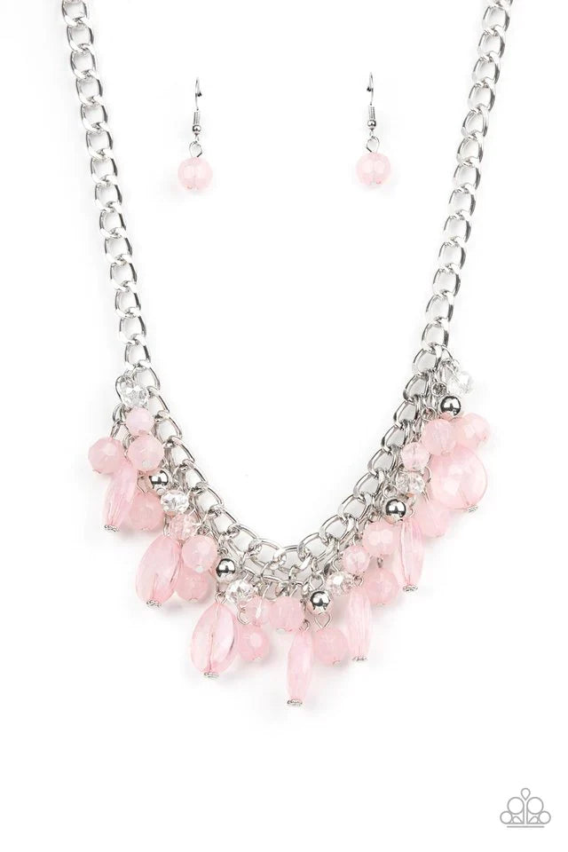 Paparazzi Accessories Beachside Dance - Pink Three wide, curved brass bars, stamped in studded textured accents, connect to a brass chain across the collar. A substantial brass disc, divided down the center with texture, swings from the bottom resulting i