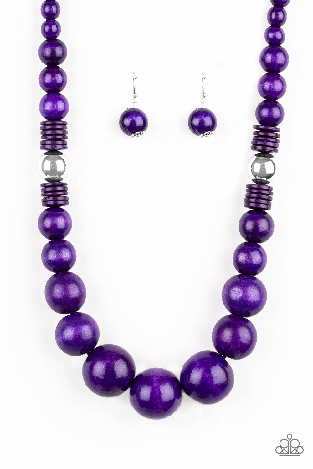 Paparazzi Accessories Panama Panorama - Purple Infused with dramatic silver beads, an array of vivacious purple wooden beads drape across the chest for a summery look. Features a button-loop closure. Jewelry