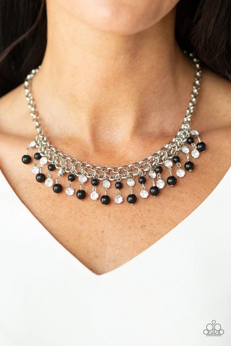 Paparazzi Accessories You May Kiss The Bride - Black Glittery white rhinestones and classic black beads swing from the bottom of interlocking silver chains, creating a bubbly fringe below the collar. Features an adjustable clasp closure. Sold as one indiv