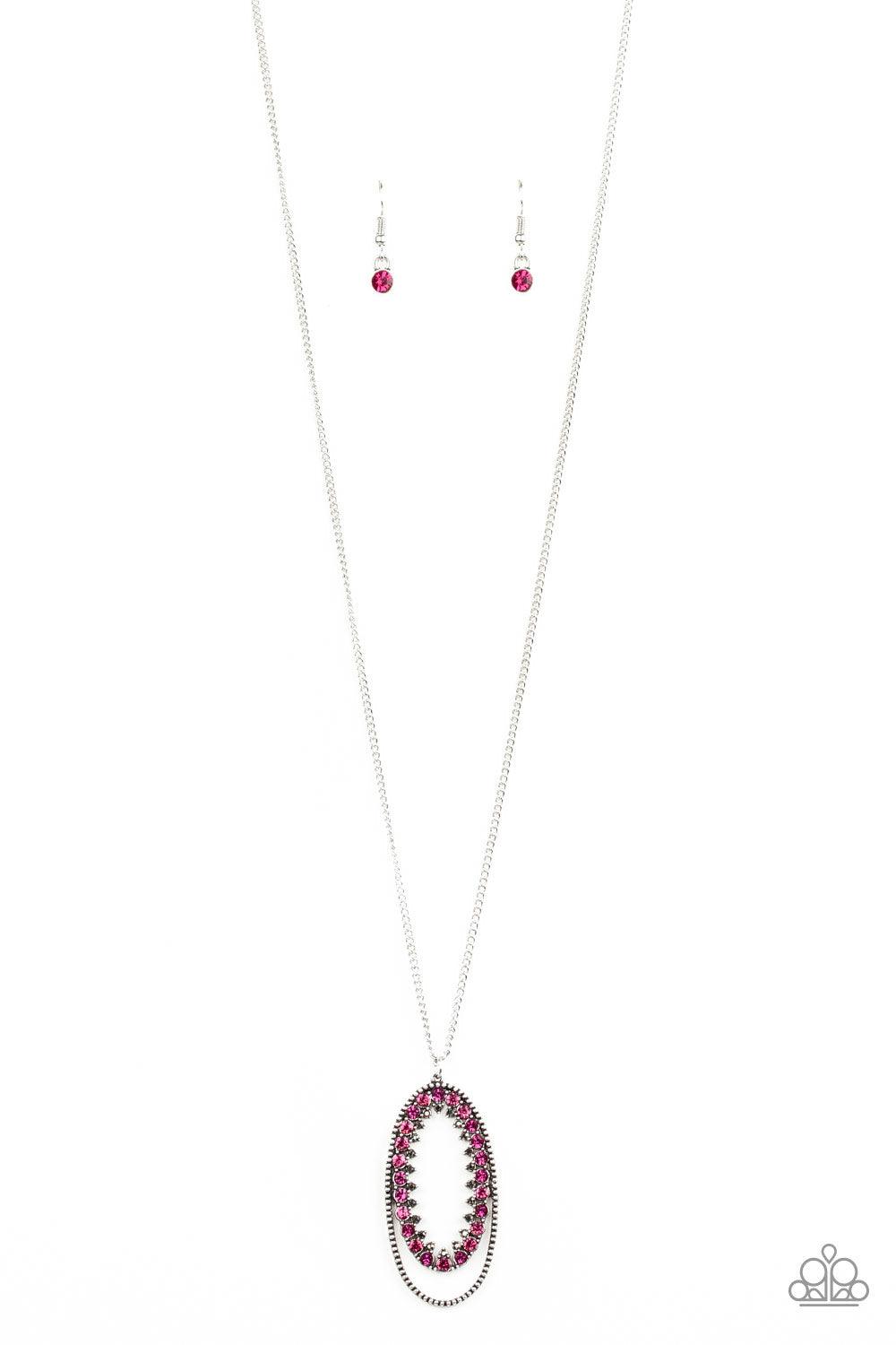 Paparazzi Accessories Money Mood - Pink Ringed in a studded silver frame, glittery pink and hematite rhinestones collect into a glamorous pendant at the bottom of a lengthened silver chain for a refined flair. Features an adjustable clasp closure. Sold as