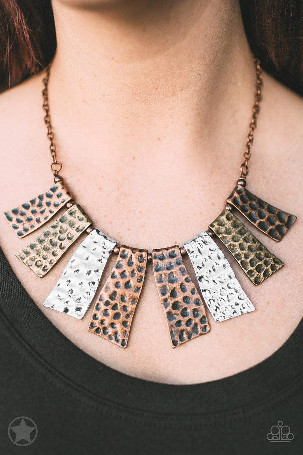 Paparazzi Accessories A Fan Of The Tribe Abstract wavy plates of copper, silver, and brass are texturized with eye-catching hammered divots and alternating copper beads along a copper chain. Features an adjustable clasp closure. Necklace