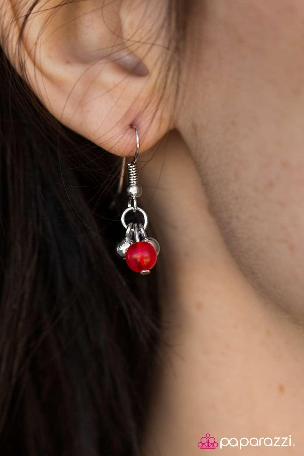 Paparazzi Accessories Twinkling Twilight - Red Red beads trickle down an elongated silver chain, creating a whimsical display. Clusters of dainty silver beads create fun and flirty accents as they trickle down the chain. Features an adjustable clasp closu