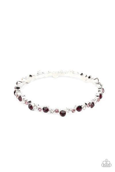 Paparazzi Accessories Twinkly Trendsetter - Purple Encased in sleek silver fittings, a twinkly collection of dark purple, purple, and white rhinestones coalesce into a glittery bangle around the wrist. Sold as one individual bracelet. Bracelets