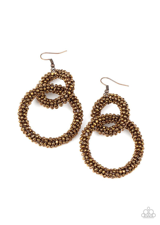 Paparazzi Accessories Luck BEAD A Lady - Copper A dainty collection of coppery seed beads adorns two interlocking hoops, creating a colorfully stacked lure. Earring attaches to a standard fishhook fitting. Sold as one pair of earrings. Jewelry