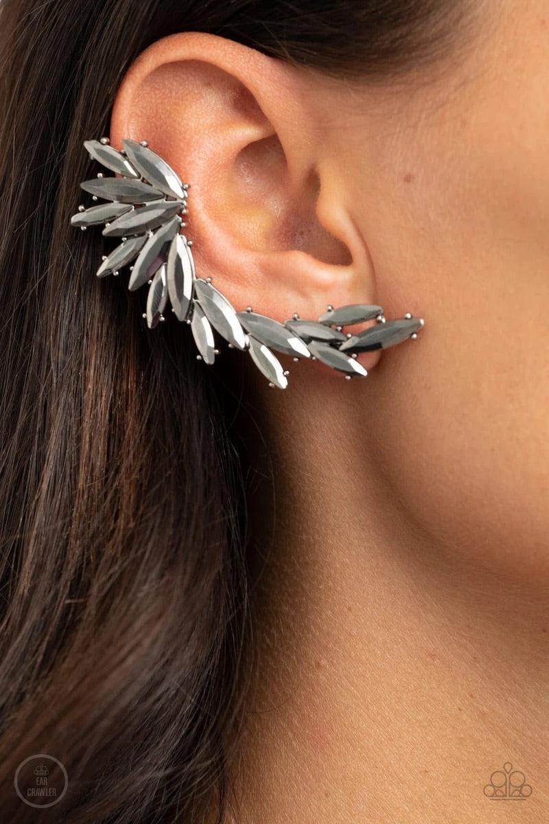Paparazzi Accessories Because ICE Said So - Silver An explosion of marquise-cut hematite rhinestones delicately climb the ear, coalescing into a smoldering frame. Earring attaches to a standard post fitting. Features a clip-on fitting at the top for a sec