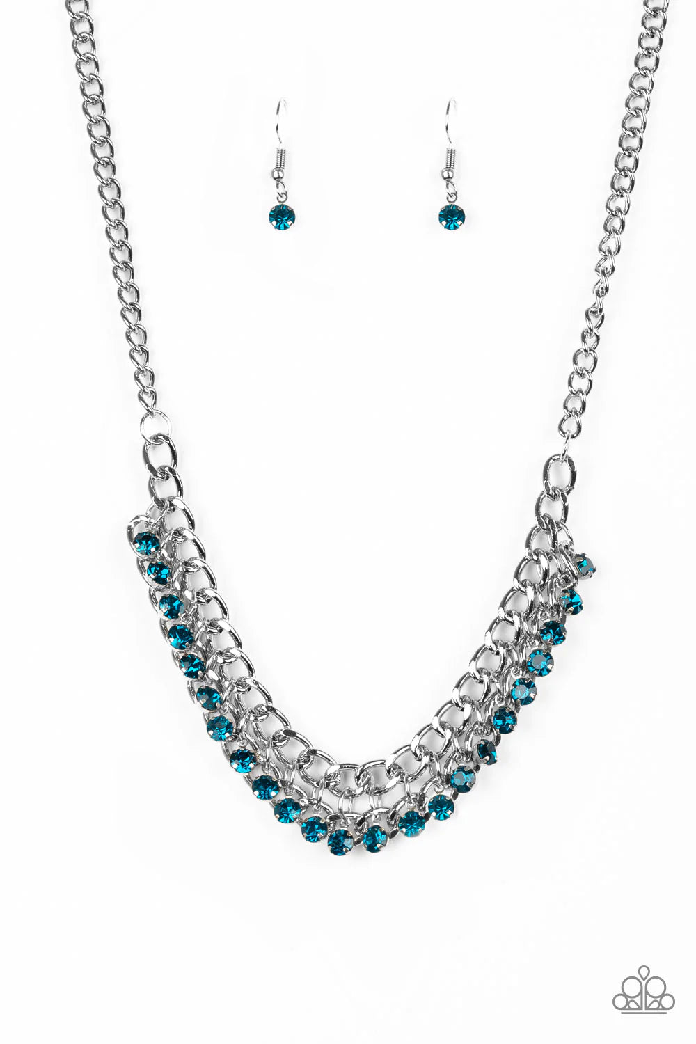 Paparazzi Accessories Glow and Grind - Blue A fringe of glittery blue rhinestones swings from the bottom of a bold silver chain below the collar for a fierce look. Features an adjustable clasp closure. Sold as one individual necklace. Includes one pair of