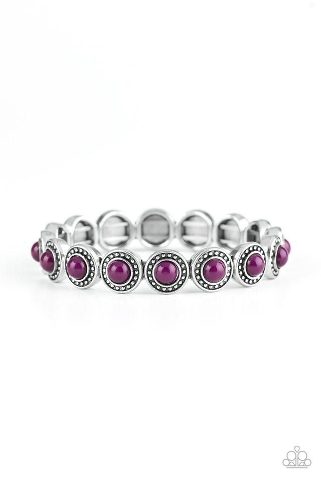 Paparazzi Accessories Globetrotter Goals - Purple Dotted with vivacious purple beaded centers, studded silver frames are threaded along stretchy elastic bands and linked around the wrist for a whimsical look. Jewelry