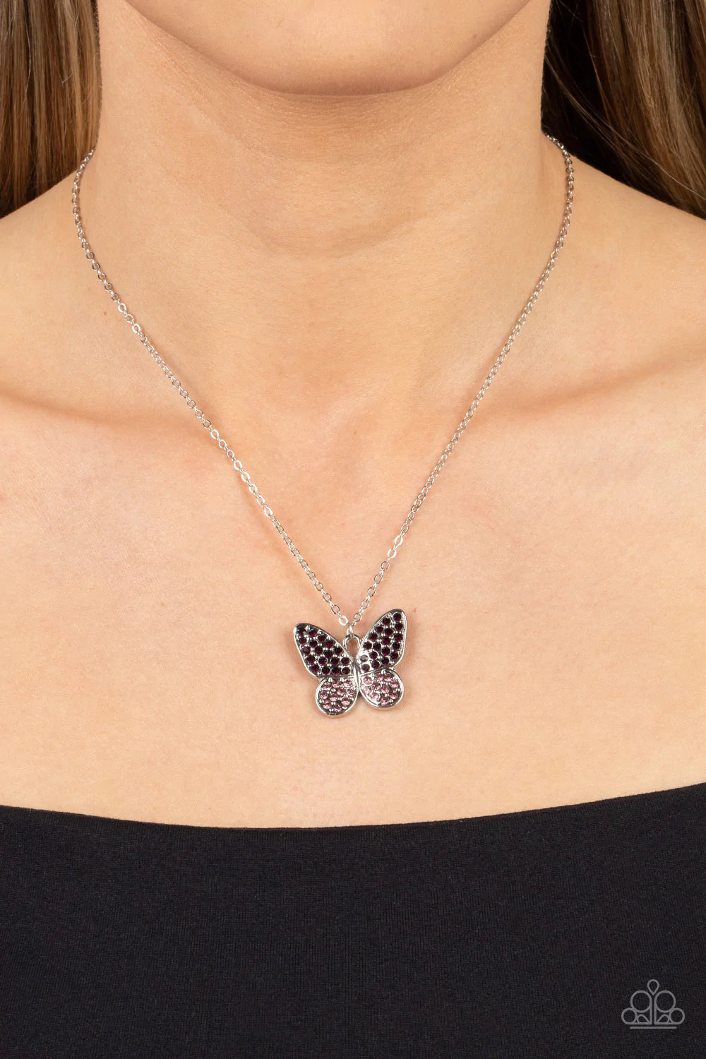 Paparazzi Accessories Flutter Forte - Purple Dotted in dark and light purple rhinestones, a whimsical silver butterfly flutters along a dainty silver chain below the collar for an enchanting fashion. Features an adjustable clasp closure. Sold as one indiv