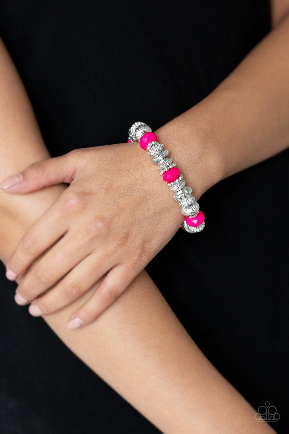 Paparazzi Accessories Live Life To The COLOR-fullest - Pink A collection of faceted pink beads, ornate silver beads, and studded silver rings are threaded along a stretchy band around the wrist for a colorfully refined look. Jewelry