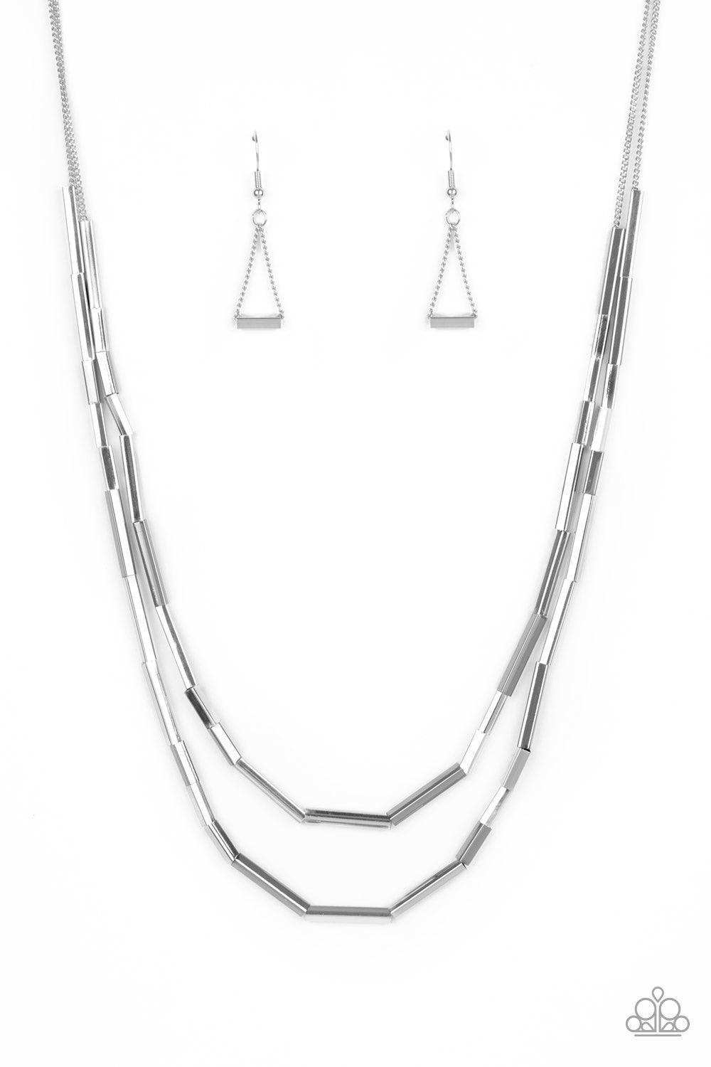 Paparazzi Accessories A Pipe Dream - Silver A collection of square rods slide along two dainty silver chains below the collar, creating edgy metallic layers. Features an adjustable clasp closure. Jewelry