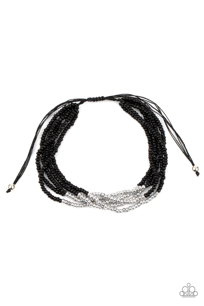 Paparazzi Accessories BEAD Bold - Black Four strands of black micro beads are accented with a bold section of silver beads for a simple yet trendy look. Features an adjustable sliding knot closure. Sold as one individual bracelet. Jewelry